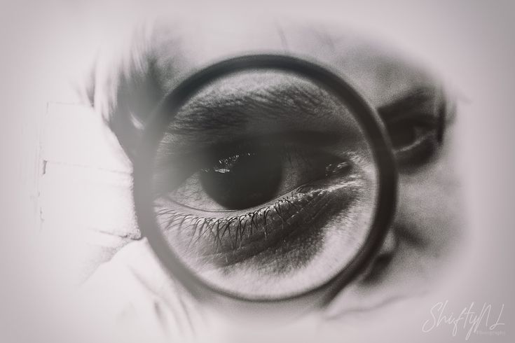 Closeup of my sons eye using a magnifying glass